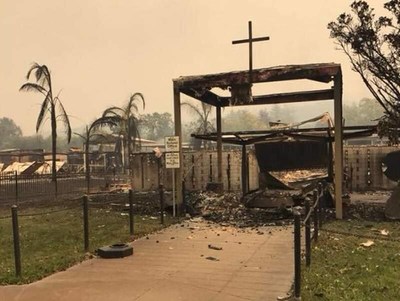 The old entry to Cardinal Newman High School following the 2017 Tubbs Fire on October 9, 2022.