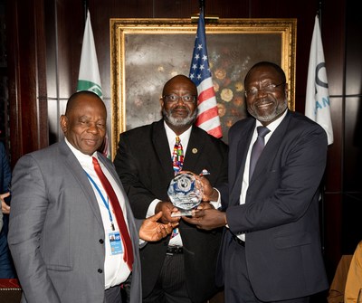 Dr. Omar Alieu Touray, ECOWAS President, and Mahama Kappiah, the ECOWAS Permanent Representative to the United Nations, accept award from Jerome Ringo, Chairman of Zoetic Global