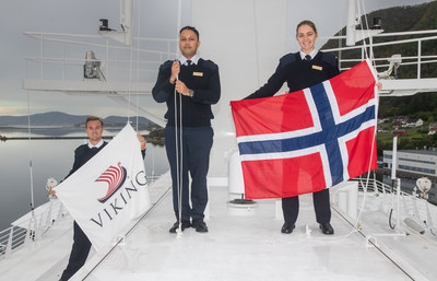 The Viking Polaris crew, pictured here, raising the ship's new flags following the delivery ceremony. For more information, visit www.viking.com.