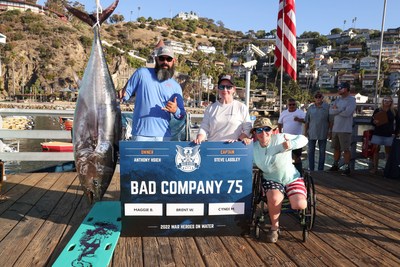 United States military veterans Brent Woodward, Cyndi Miles, and Maggie Bilyeu pose with their catch at the fifth annual War Heroes on Water (WHOW) sportfishing tournament on Monday, Sept. 26, 2022 in Avalon, Calif. Harnessing the healing powers of the ocean and the thrill of team-based competition, this three-day sportfishing tournament off the coast of Southern California helps combat-wounded veterans recover from their physical and emotional wounds.
