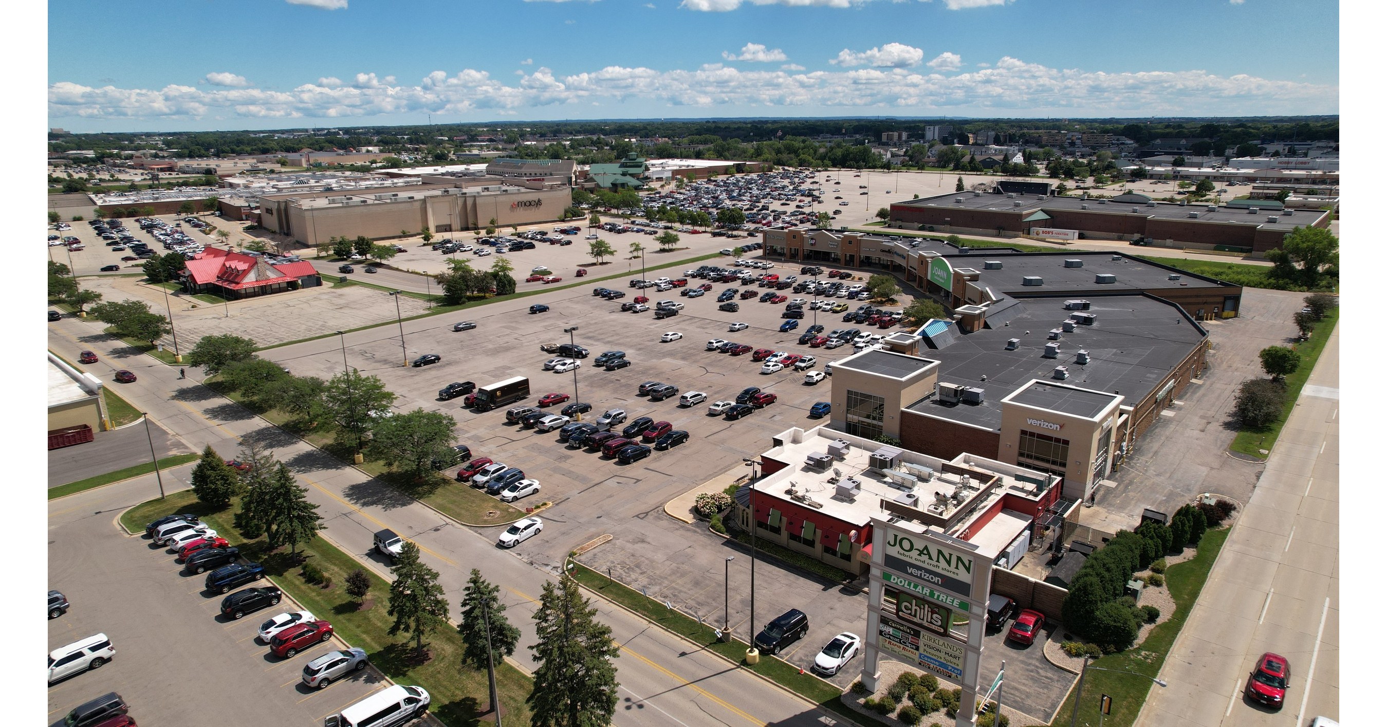 PRAIRIE HILL COMPLETES PURCHASE OF 70,000 SQ FT SHOPPING CENTER FOR 12
