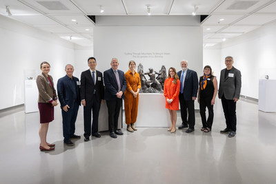 GSU Faculty, Liu Shiming Art Foundation President, and GSU Liu Shiming Scholar Leslie Drennan pictured alongside Liu Shiming's sculpture, 