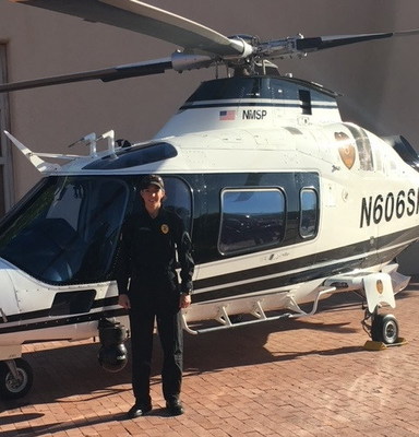 LeAnne Gomez in front of the NMSP helicopter in 2018.