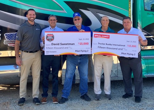 David Sweetman receives $15,000 grand prize and a surprise donation to Trucker Buddy on his behalf as the 2022 Pilot Flying J Road Warrior winner.