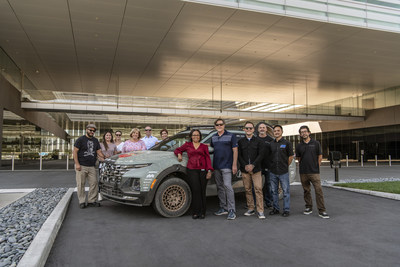 The team that prepared the Brute Squad’s 2022 Hyundai Santa Cruz stand with the vehicle at Hyundai Motor North America’s headquarters in Fountain Valley, Calif., on Sept. 28, 2022.