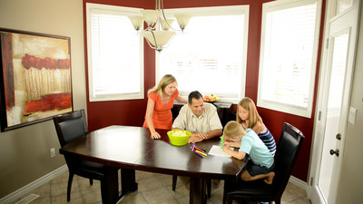 Family working on their fire escape plan (CNW Group/The Co-operators Group Limited)