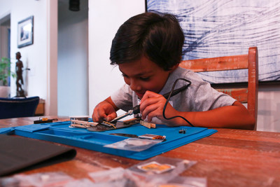 Tigran (10) learns electronics through building his own game console