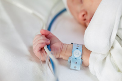 Pediatric patient holding IV lines (CNW Group/Covalon Technologies Ltd.)