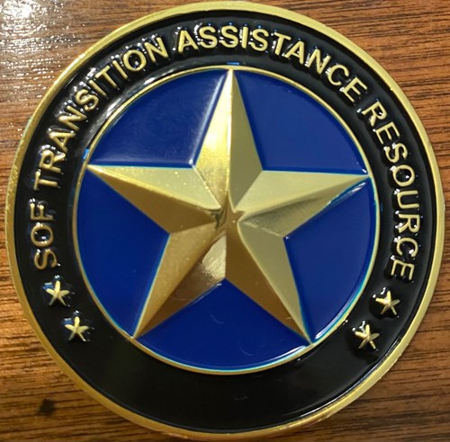 Kathleen was given a “Challenge Coin” after giving a speech at a SOF transition assistance event. She discussed the top three (3) GAPS in the SOF transition process and the critical tactics needed to be successful. A challenge coin is a symbol of commitment and morale and serves as a token of appreciation or thanks..