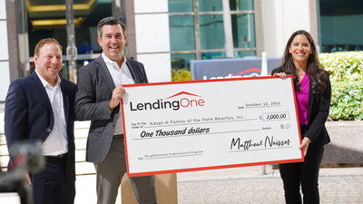 Matthew Neisser, CEO & Co Founder of LendingOne (center) and Joshua Marcus, the company's General Counsel (left) present a 
