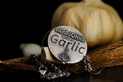 Papa Johns has launched its first-ever piece of jewellery – the Stranger Bling necklace – inspired by its iconic Special Garlic Dipping Sauce (PRNewsfoto/Papa John's International)