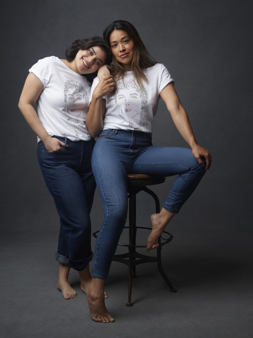 Actress Gina Rodriguez and FSF Scholar Valeria Nicole model the winning design from Anne Klein's Fashion Scholarship Design competition. The commemorative t-shirt is now available at Macy's and AnneKlein.com.