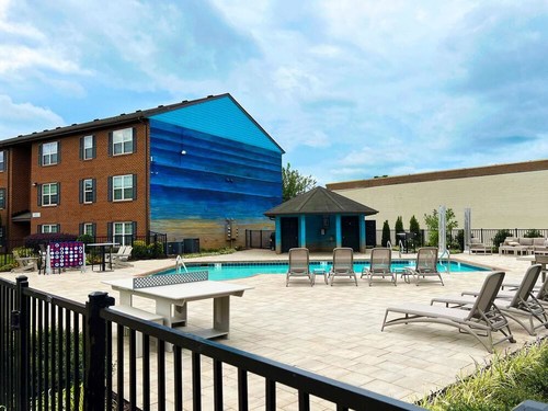 North Hill Apartments in Virginia Beach have recently received upgrades across the property, including the dog park, fitness center, an outdoor patio and a renovated pool area that is highlighted by a mural created by local artists. To see more images from North Hill, visit https://livenorthhillapts.com/Gallery.aspx.