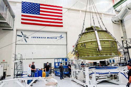 The Orion crew module pressure vessel for the Artemis III mission—the first vehicle under the Lockheed Martin OPOC contract—is undergoing assembly at NASA’s Kennedy Space Center.
