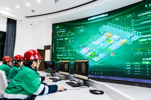 Employees of Jinchuan Group work at one of the company's intelligent factories.