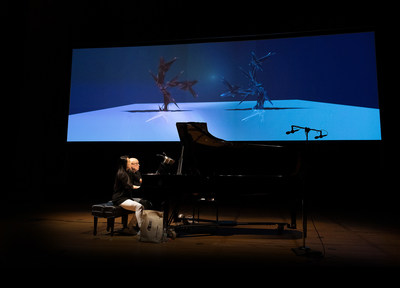 Dennis Russell Davies and Maki Namekawa perform at Hertz Hall in Berkeley, Calif. on March 5, 2022 at a performance organized by 2022 Hewlett 50 Arts Commissions recipient Other Minds. Projections were included live by Cori O’Lan (aka Gerfried Stocker), artistic director of Ars Electronica in Linz, Austria. Photo courtesy of David Magnusson and Other Minds.