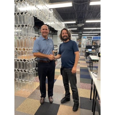 Tosca CEO Eric Frank (left) poses with TerraCycle and Loop CEO, Tom Szaky (right)