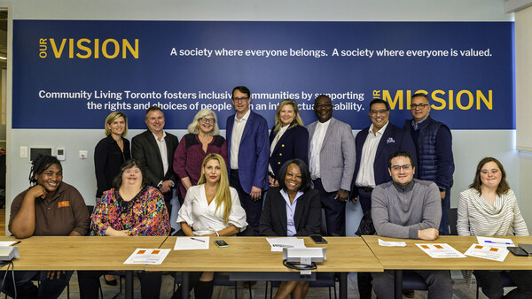 Monte McNaughton, Ontario’s Minister of Labour, Immigration, Training and Skills Development visits with MyJobMatch partners at Community Living Toronto. (CNW Group/Community Living Toronto)
