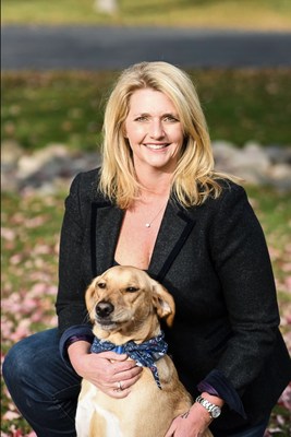 Ellen Forsyth, Kradle's Chief Customer Officer, pictured above with her dog, Oakley.