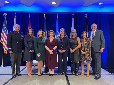Recipients of the 2022 Fisher Service Award gather together with General John W. 