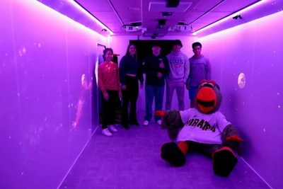 Students at Chartiers Valley High School, along with the Pittsburgh Pirates Parrot, get a first look at the interior of Chill Mobile.