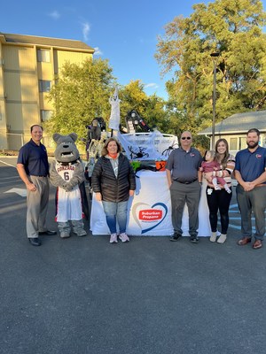 Representatives from Joya and Suburban Propane come together to hand out sweet treats at the organization’s annual Trunk-or-Treat. Spike the Bulldog, mascot for the Gonzaga University Bulldogs also joined in on the fun. The effort is part of Suburban Propane’s SuburbanCares initiative in communities across the nation. (photo courtesy of Suburban Propane).