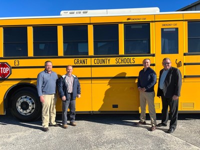 Grant County Schools taking delivery of a GreenPower BEAST all-electric, purpose-built school bus. In the photo are Tony Oates, Grant County Treasurer, Mike VanMeter, Grant County Public Schools Transportation Director, Mitch Webster, Grant County public schools superintendent and Mark Nestlen, GreenPower Vice President of Business Development and Strategy.