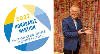 Dana Fischer, Director, Regulatory Strategy, accepts the Integrated Home Competition 2022 Honorable Mention Award on behalf of Mitsubishi Electric Trane HVAC US LLC for the Deluxe Wall-mounted System with H2i plus® and kumo touch™ wireless controller.