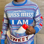 Sleigh The Season with the New Swiss Miss Holiday Sweater