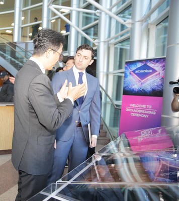 Absolics Chief Operating Officer, Gary Park, speaks to U.S. Senator Jon Ossoff about the breakthrough technology that will be manufactured at the new Covington facility.