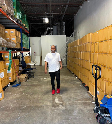 Jason Panda CEO and Founder of B Condoms in warehouse.