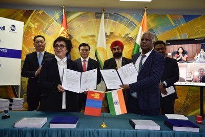 Executive Director, Mongol Refinery Dr Altantsetseg and Mr P. Doraiah, Director Hydrocarbons, MEIL post agreement signing