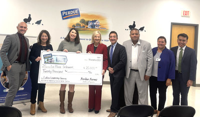 Perdue Farms presents a $20,000 grant to support a new La Plaza Delaware Latino leadership training program. From left to right are Edwin Hernández, Community Relations & Outreach Director, Office of Lt. Governor Bethany Hall-Long; Co-Chair of the Delaware Hispanic Commission’s Latino Leadership Development Committee; Mary Dupont, Executive Director, La Plaza Delaware; Kim R. Nechay, Executive Director, The Franklin P. and Arthur W. Perdue Foundation; Delaware Lt. Governor Bethany Hall-Long; Carlos de los Ramos, Chair, Delaware Hispanic Commission; Gary Miller, Vice President of Human Resources and Interim Chief Diversity Officer, Perdue Farms; Michelle Jewell, Program Analyst, Office of Governor John Carney; Rony Baltazar-Lopez, Vice Chair, Delaware Hispanic Commission.