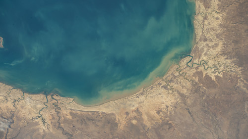 An area of the Gulf of Carpentaria on Australia’s northern coast is shown from the International Space Station in September. The SWOT satellite will measure the height of nearly all the water on Earth, including lakes, rivers, reservoirs, and the ocean. Credit: NASA