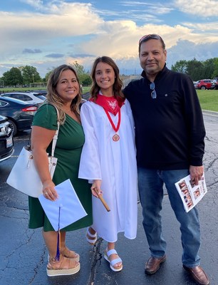 Adrianne Noworul of Naperville, Ill. poses with her daughter, Alyssa Noworul and Rajeev Dixit, M.D., a neonatologist at Edward Hospital in Naperville, at Alyssa's graduation from Benet Academy in Lisle, Ill. Dr. Dixit cared for Alyssa in the Newborn Intensive Care Unit and has inspired her to pursue a career in medicine.