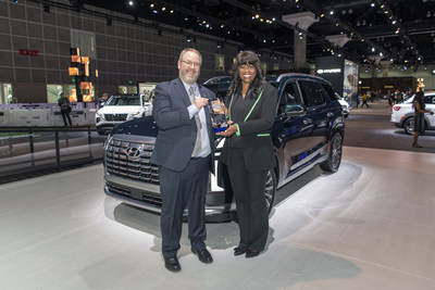 Olabisi Boyle (right), vice president, product planning and mobility strategy, Hyundai Motor North America accepts the 2023 Best SUV Brand Award from John Vincent (left), senior reporter, Autos, U.S. News & World Report in Los Angeles, Calif., on Thursday, November 17, 2022.