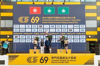 Ho Iat Seng, Chief Executive of the Macao SAR, presents the championship trophy to Chang Wing Chung of Macao at the conclusion of Sunday’s Sands China Formula 4 Macau Grand Prix, while Sands China Ltd. President Dr. Wilfred Wong presents the second-place trophy to Gerrard Xie Wing Lam of Hong Kong and the third-place trophy to Leong Hong Chio of Macao.