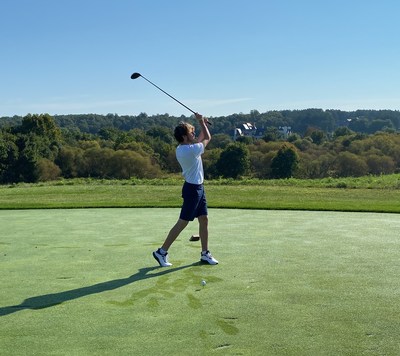 Kyle, 17, kicks off the 2022 TNS Golf Tournament in support of Our Military Kids with a strong swing off the first tee. Kyle received an OMK activity scholarship to fully fund golf camp and driver's education during his father's deployment.