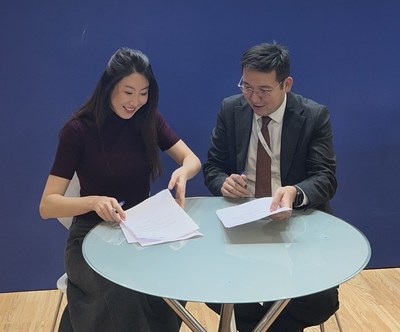 From left to right: Amanda Wang, Global Sales Director at Trip.com Group with Talgat Amanbayev, Chairman of the Board "Kazakh Tourism" National Company" JSC