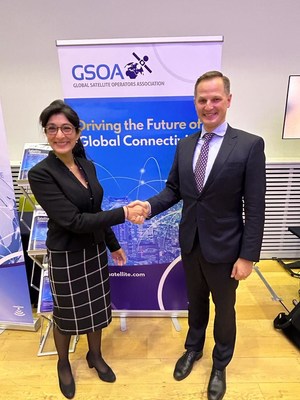 Aarti Holla-Maini, GSOA General Secretary (left) and Severin Meister, Rivada Space Networks CEO, shake hands.