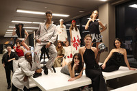 With Love Halston November 28, 2022 Event Hosted by Istituto Marangoni Miami. Finalists with models wearing designs. The photo is an homage to the 1977 Fairchild photograph of designers and models in Halston's atelier.