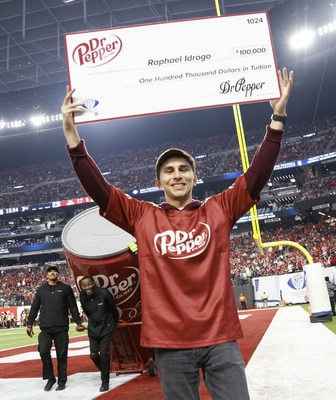 Raphael I., after winning the Dr Pepper Tuition Toss during halftime at the 2022 Pac-12 Conference Championship Game on Friday, Dec. 2, 2022, at Allegiant Stadium in Las Vegas, accepting the award. (Bizuayehu Tesfaye/AP Images for Dr Pepper)