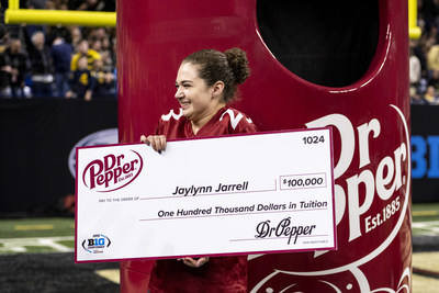 Jaylynn J. reacts after winning the Dr Pepper Tuition Toss during halftime at the 2022 Big Ten Conference Championship Game on Saturday, Dec. 3, 2022, at Lucas Oil Stadium in Indianapolis. (Doug McSchooler/AP Images for Dr Pepper)