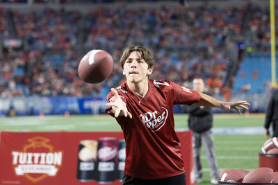 Gavin K. competing in the Dr Pepper Tuition Toss during halftime at the 2022 ACC Conference Championship Game on Saturday, Dec. 3, 2022, at Bank of America Stadium in Charlotte, N.C. (Jason Walle/AP Images for Dr Pepper)