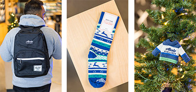 Alaska Airlines has backpacks to carry all of your essentials and don’t let your toes miss out on our holiday-themed socks and other cozy apparel.