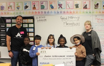Populus Financial Group presented a $15,000 donation to Junior Achievement while teaching JA in a Day at J.O. Davis Elementary