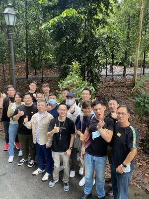 Big smiles all on the faces of BIGOers, as they completed their decoration of their tree at the Singapore Botanical Gardens