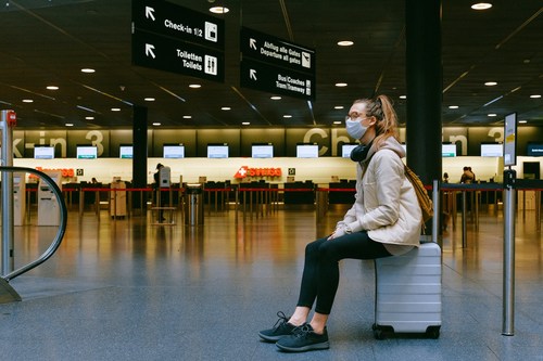 ‘Frustrated traveller at an airport, designed by Freekpik’