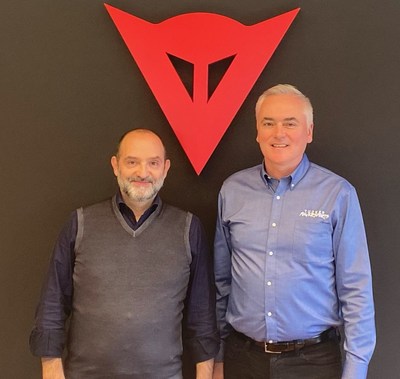 Dianese Group CEO Cristiano Silei (left) joins Tucker Powersports CEO Marc McAllister after completing a partnership agreement making Tucker Powersports the exclusive distributor for Dainese motorcycle riding gear and footwear in the USA.