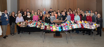 The Ladies of The Legacy Willow Bend with their annual donation of handmade knit and crocheted goods.